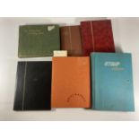 A MIXED LOT OF ASSORTED STAMP ALBUMS