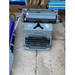 A VINTAGE AND RETRO IMPERIAL 70 TYPE WRITER