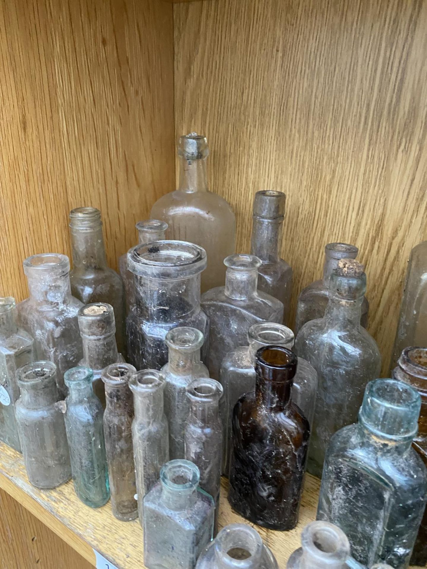 A LARGE QUANTITY OF MINITURE GLASS MEDICINE BOTTLES - Image 3 of 3