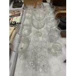 A QUANTITY OF GLASSWARE TO INCLUDE BRANDY GLASSES, CHAMPAGNE GLASSES, SHERRY GLASSES ETC.,