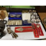 A LARGE QUANTITY OF BOXED VINTAGE FLATWARE TO INCLUDE A SERVING SET, KNIVES, FORKS, SPOONS, CAKE