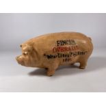 A CAST METAL FINCK'S BUTCHERS PIG MODEL