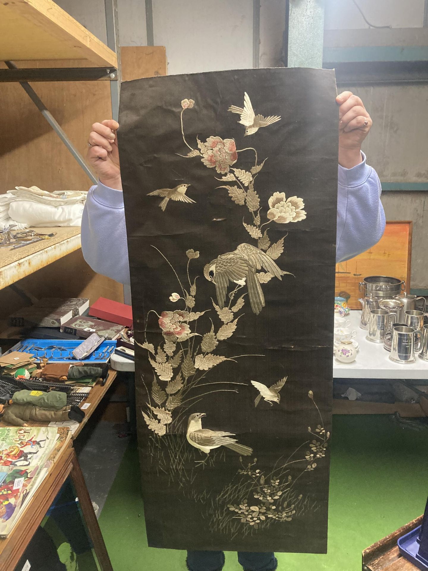 A SILK WALL HANGING EMBROIDERED WITH BIRDS AND FLOWERS