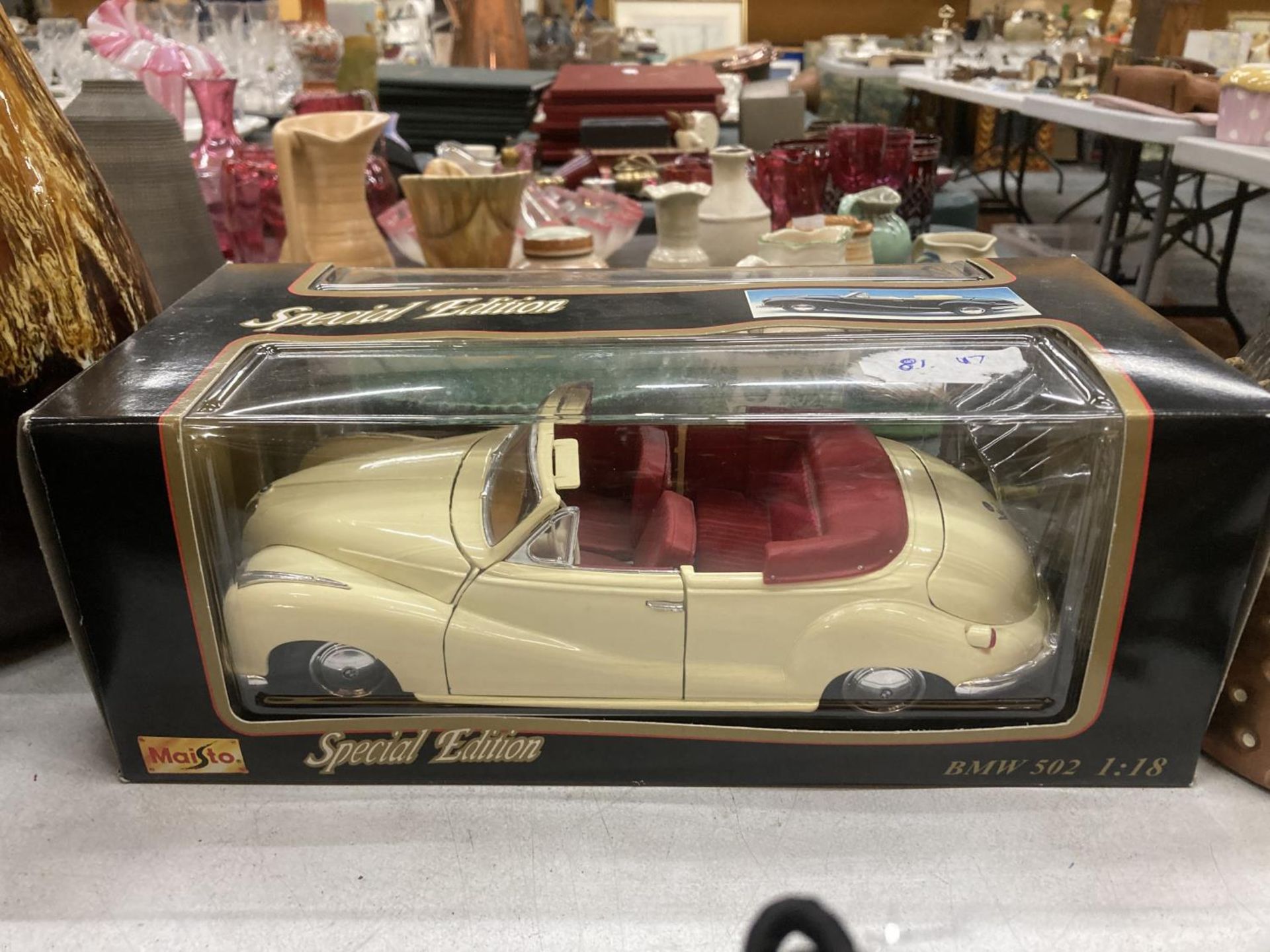 A BOXED MAISTO SPECIAL EDITION 1:18 SCALE BMW 502
