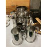 A QUANTITY OF SILVER PLATE TO INCLUDE AN ICE BUCKET, TANKARDS, GOBLET, TEAPOTS, ETC.,