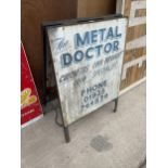 A METAL A FRAME 'THE METAL DOCTOR' SIGN