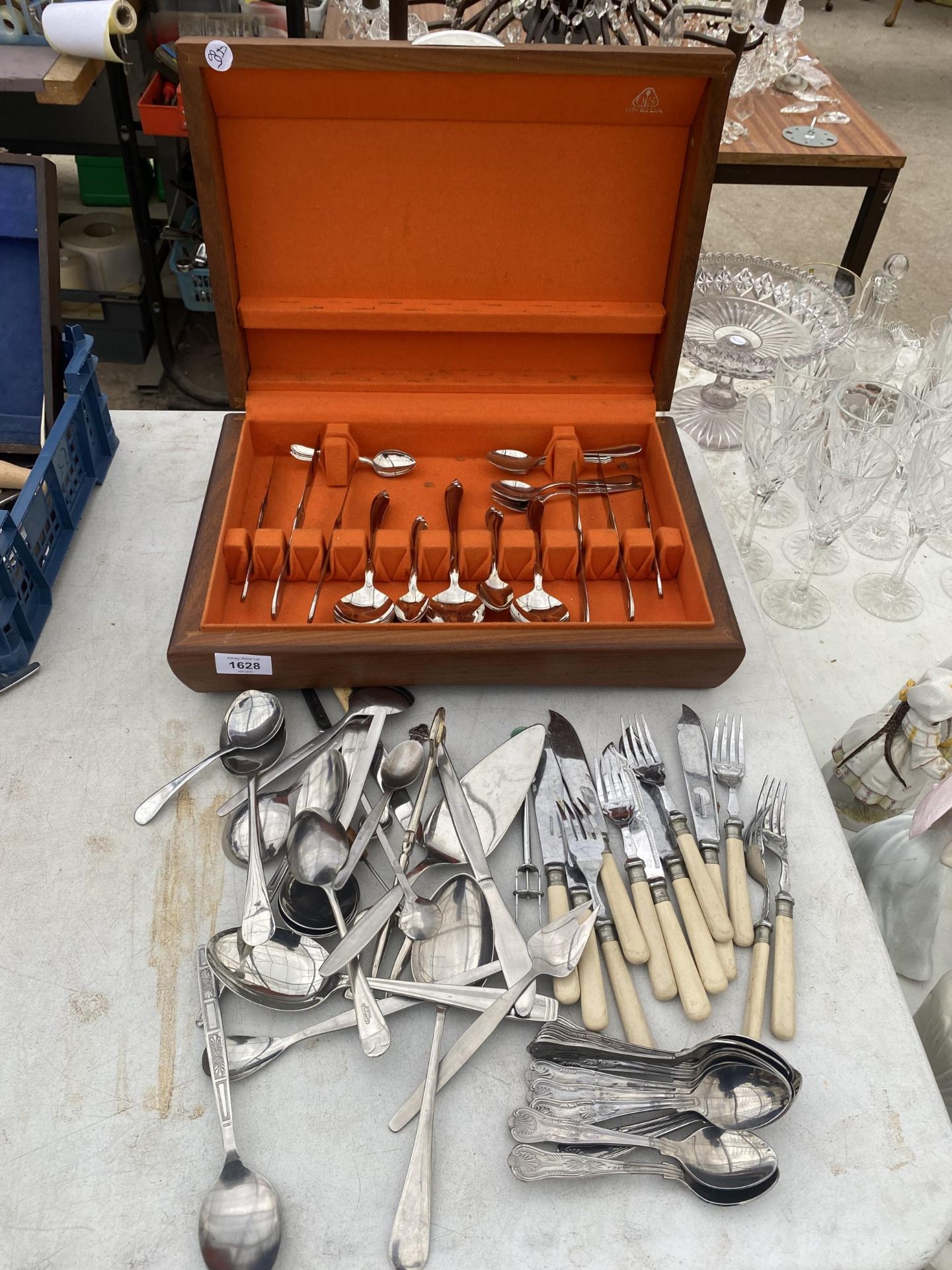 A PART COMPLETE TEAK CANTEEN OF CUTLERY