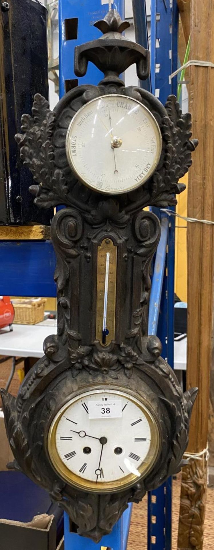 A 19TH CENTURY COALBROOKDALE STYLE CAST METAL WALL CLOCK / BAROMETER, HEIGHT 64CM