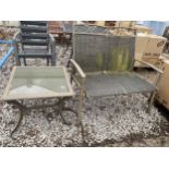 A TWO SEATER GARDEN SEAT AND A GLASS TOPPED OCASIONAL TABLE