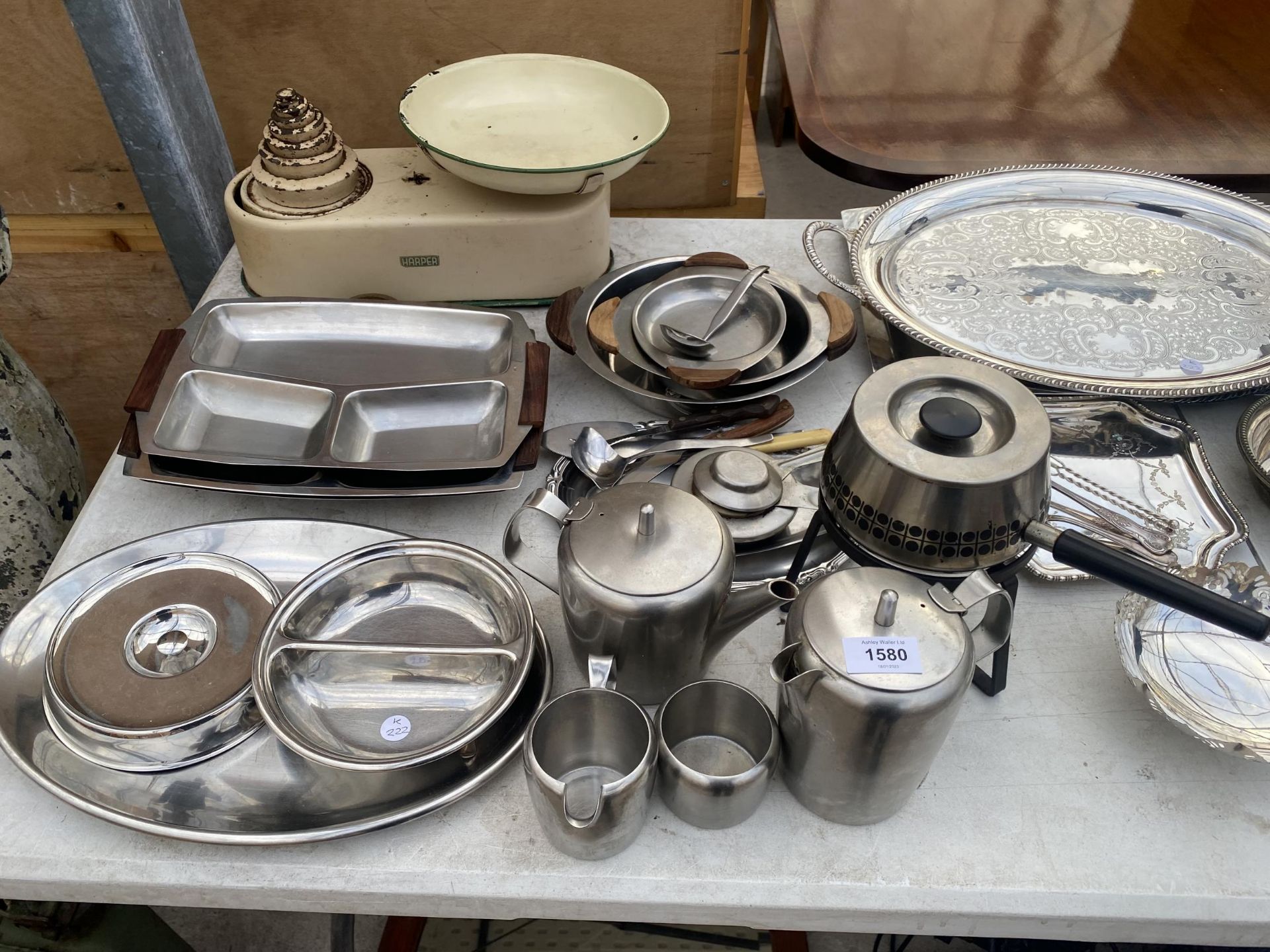 AN ASSORTMENT OF STAINLESS STEEL KITCHEN ITEMS TO INCLUDE TRAYS, TEAPOTS AND A SET OF HARPER