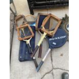 AN ASSORTMENT OF VINTAGE WOODEN TENNIS AND BADMINTON RACKETS SOME WITH COVERS