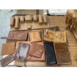 A QUANTITY OF LEATHER PURSES, WALLETS, PASSPORT HOLDERS, ETC.,