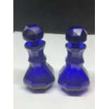 A PAIR OF VINTAGE BRISTOL BLUE SCENT BOTTLES