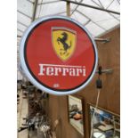 AN ILLUMINATED CIRCULAR DOUBLE SIDDED FERRARI WALL SIGN