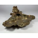 AN ART NOUVEAU BRASS INKSTAND WITH LADIES HEAD DESIGN TOP, (MISSING ONE INKWELL)