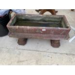 A RECONSTITUTED STONE ORIENTAL STYLE TROUGH PLANTER