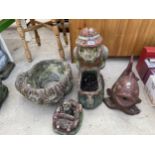 FOUR RECONSTITUTED STONE GARDEN FIGURES TO INCLIUDE A PIG PLANTER, A FISH AND A FROG ETC