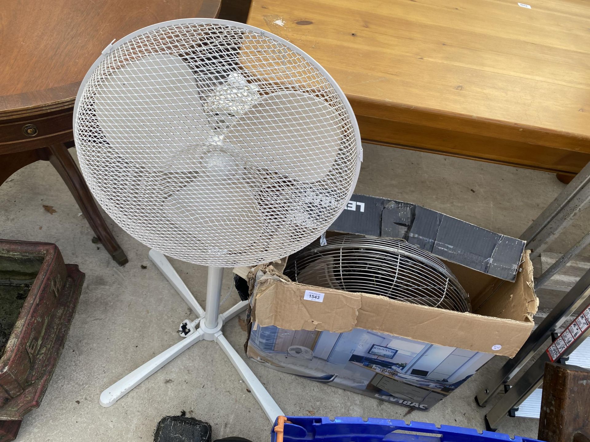 TWO ELECTRIC FLOOR FANS