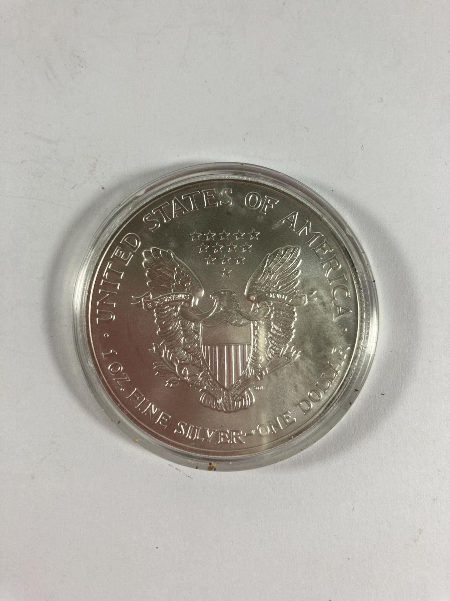 A 2002 AMERICAN SILVER 1OZ DOLLAR COIN