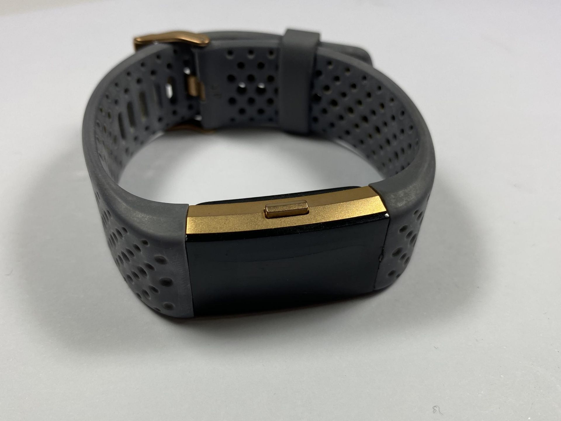 A FITBIT WATCH IN WORKING ORDER