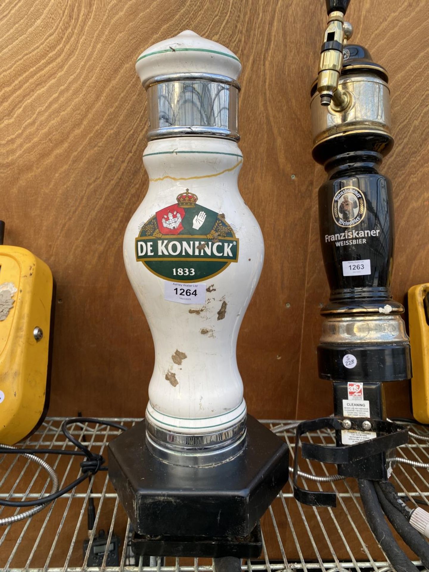 A CERAMIC 'DE KONINCK' BEER PUMP