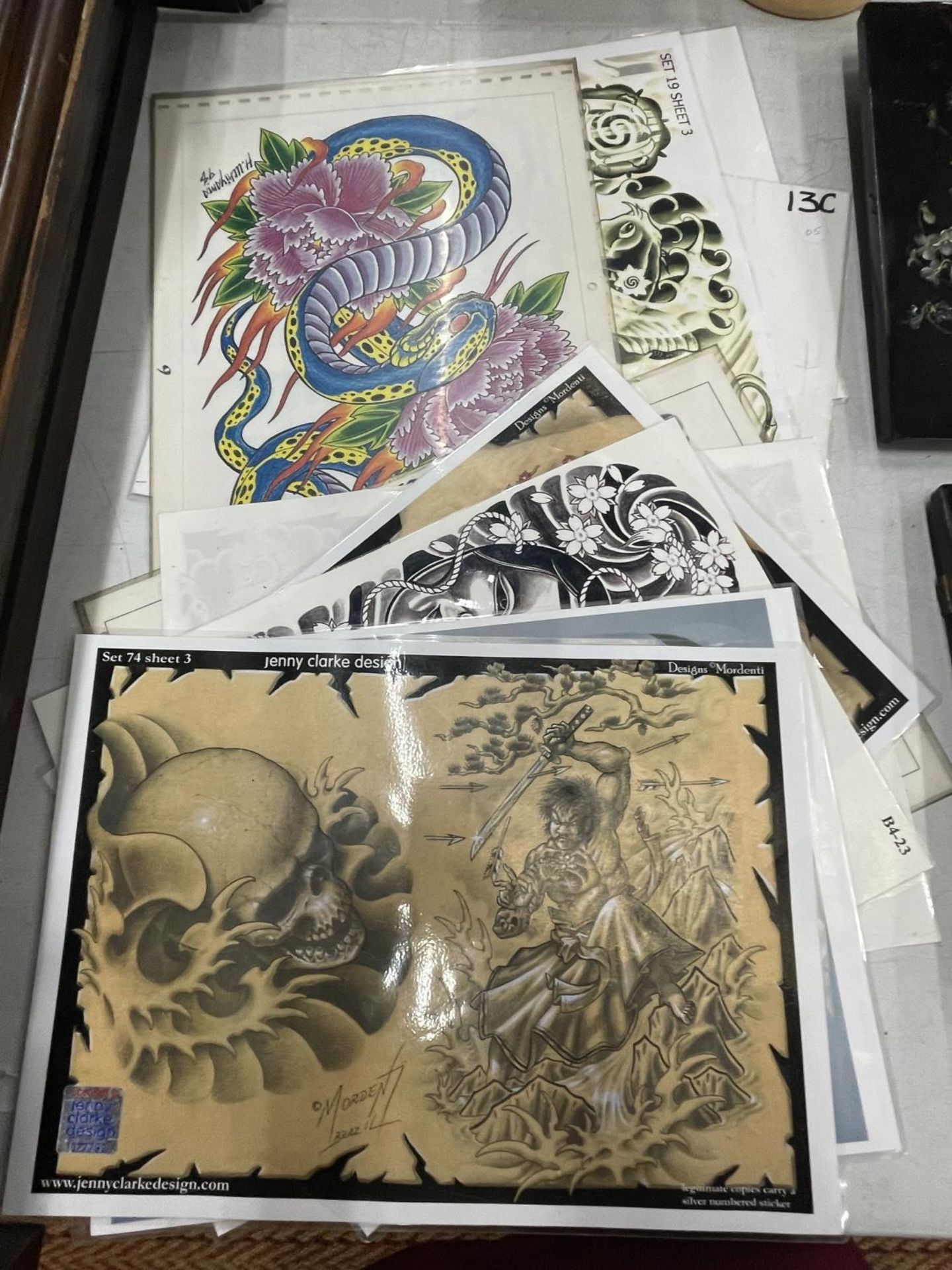 TEN LAMINATED LIMITED EDITION ORIENTAL TATTOO DESIGNS