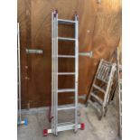 A 21 RUNG THREE SECTION ALUMINIUM LADDER