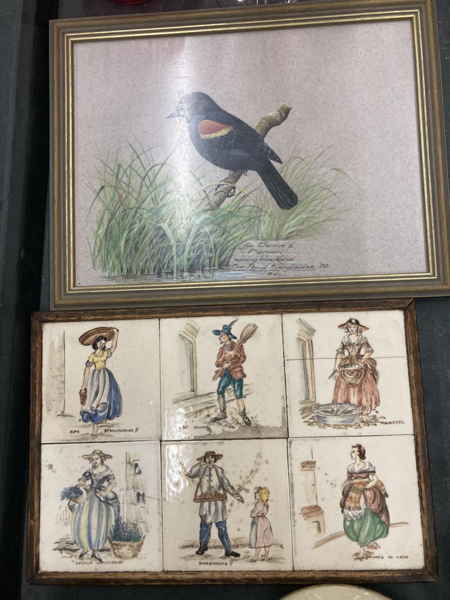 A FRAMED TILE OF A REDWING BLACKBIRD AND SIX FURTHER TILES IN A FRAME