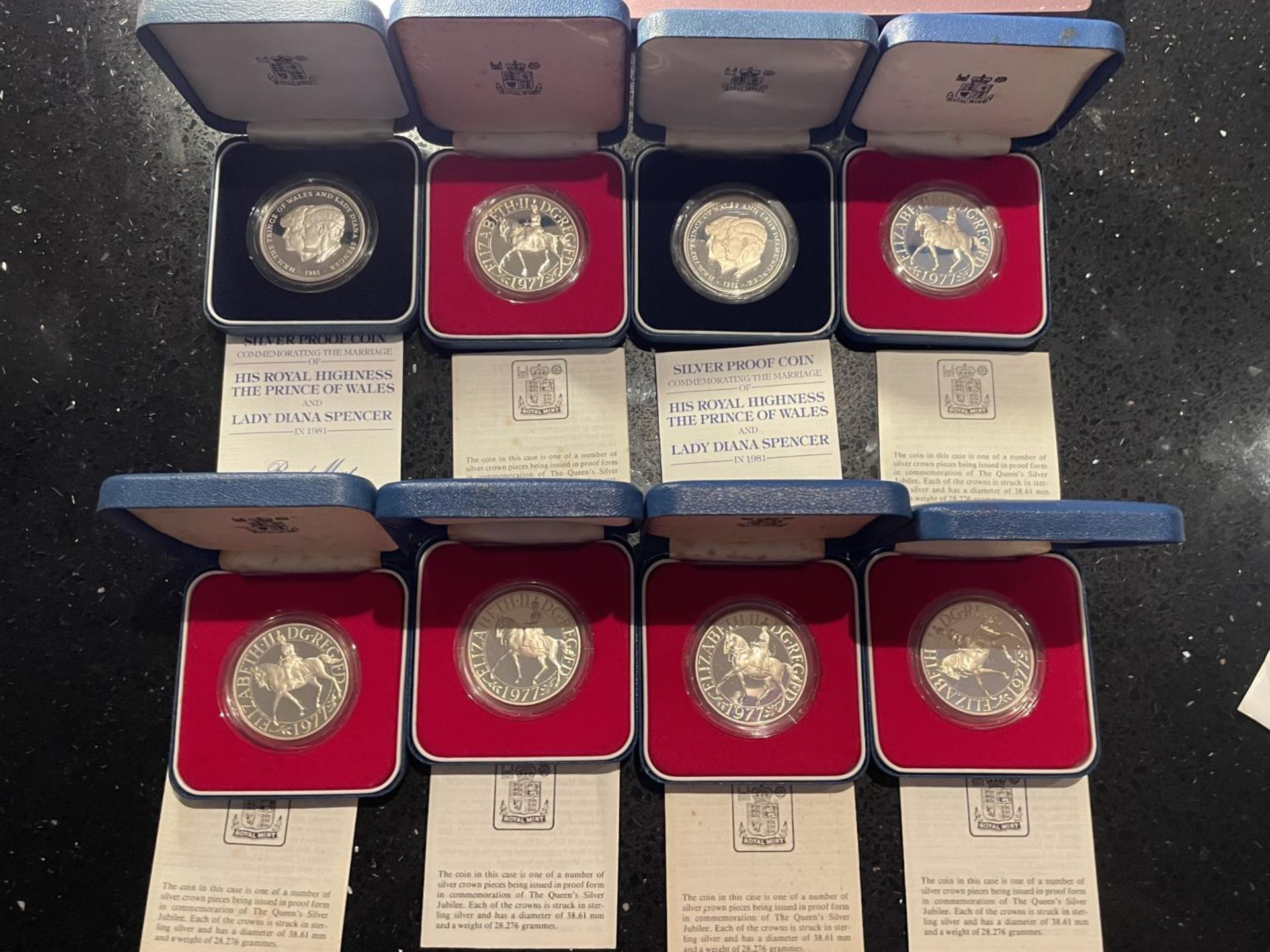 EIGHT UK , ROYAL MINT , SILVER CROWNS . SIX ARE FROM THE 1977 SILVER JUBILEE AND TWO FROM THE 1981