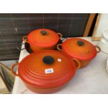 THREE LE CREUSET LIDDED COOKING POTS AND A FURTHER FRYING PAN