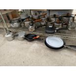 A LARGE ASSORTMENT OF KITCHEN ITEMS TO INCLUDE POTS AND PANS ETC