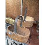 TWO GRADUATED WOODEN TRUGS WITH METAL BANDED HANDLES