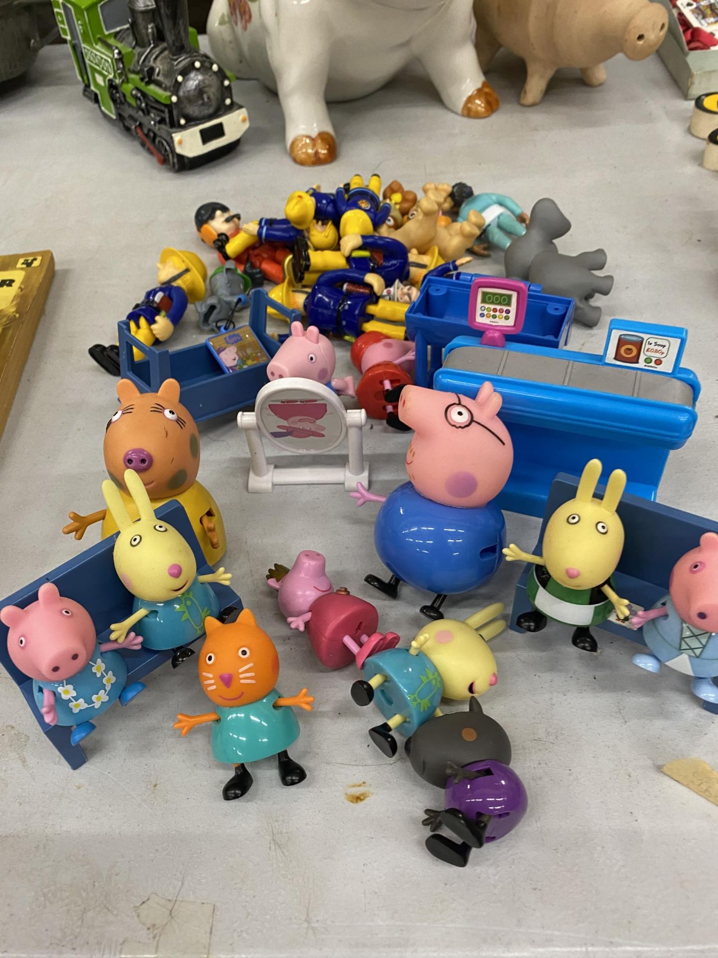 A QUANTITY OF PEPPA PIG FIGURES, PAW PATROL AND FIREMAN SAM