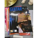 A QUANTITY OF MUSIC BOOKS MAINLY GUITAR AND PIANO