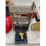 A VINTAGE WOODEN STEP LADDER AND A DEWALT BATTERY DRILL