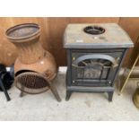 A GAS FIRE IN THE FORM OF A LOG BURNER AND A GARDEN CHIMENEA