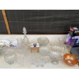 A LARGE ASSORTMENT OF GLASS WARE TO INCLUDE A DECANTER, BOWLS AND TWO JANE CHARLES PLATES ETC