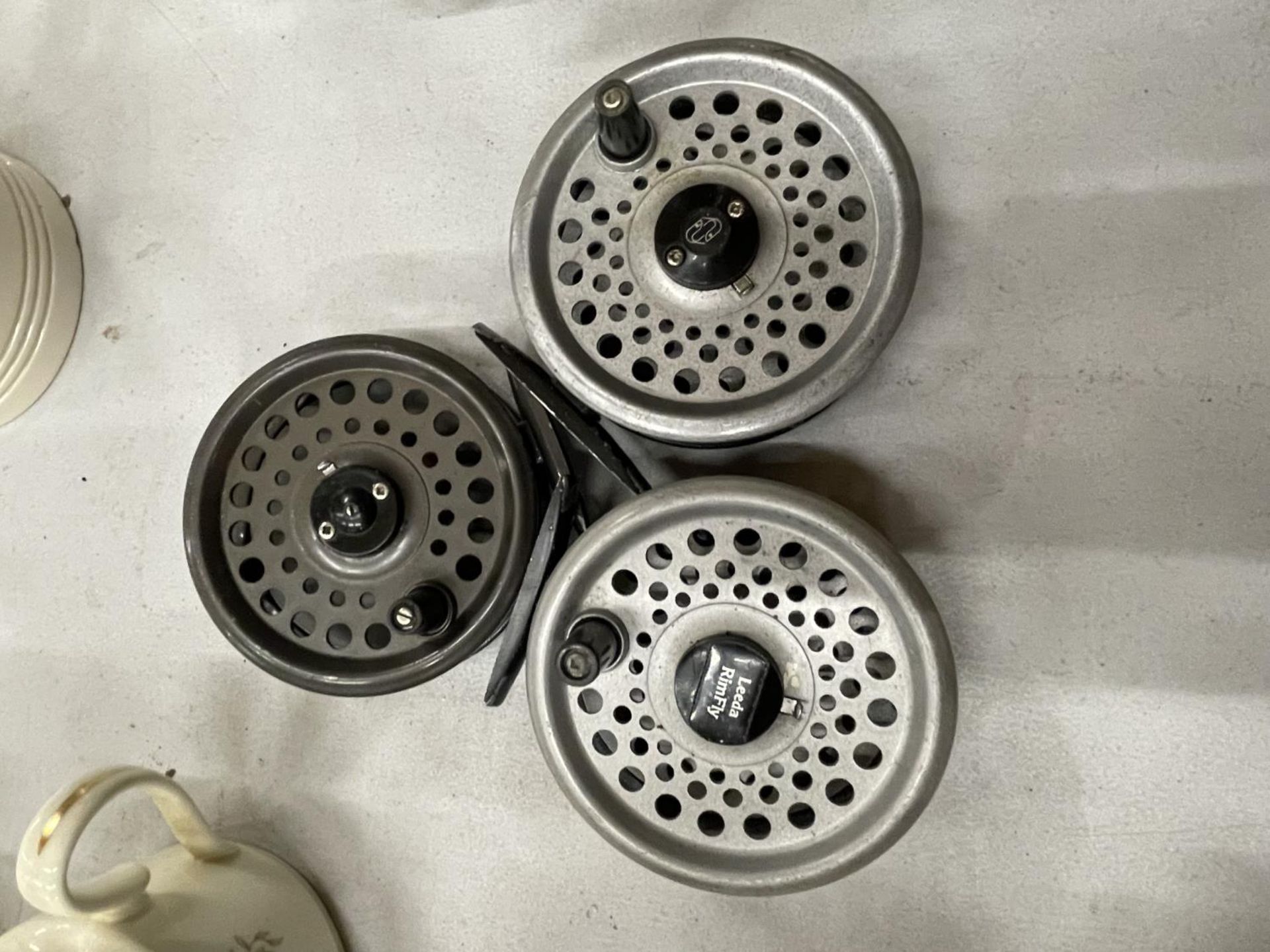 THREE INTREPID RIMFLY FISHING REELS