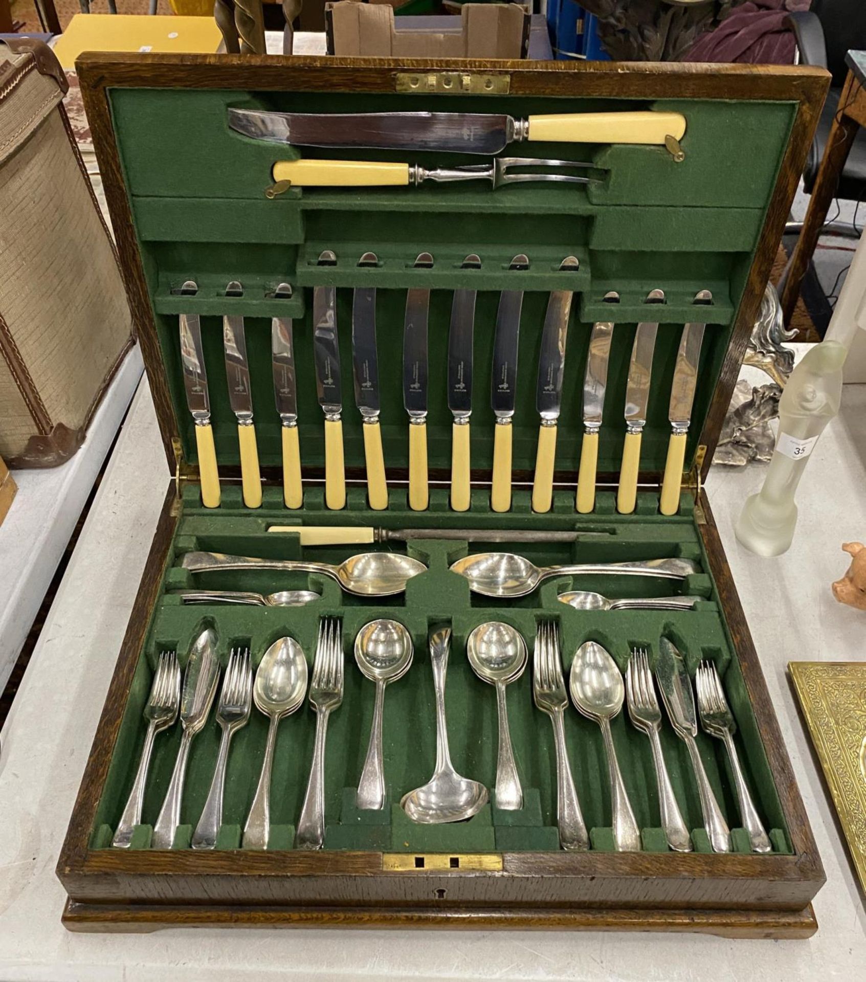 AN OAK CASED CANTEEN OF CUTLERY, ATKIN BROTHERS, SHEFFIELD