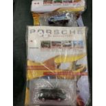 TWO DEAGOSTINI PORSCHE MODEL COLLECTIONS MAGAZINES WITH PORSCHE CARS