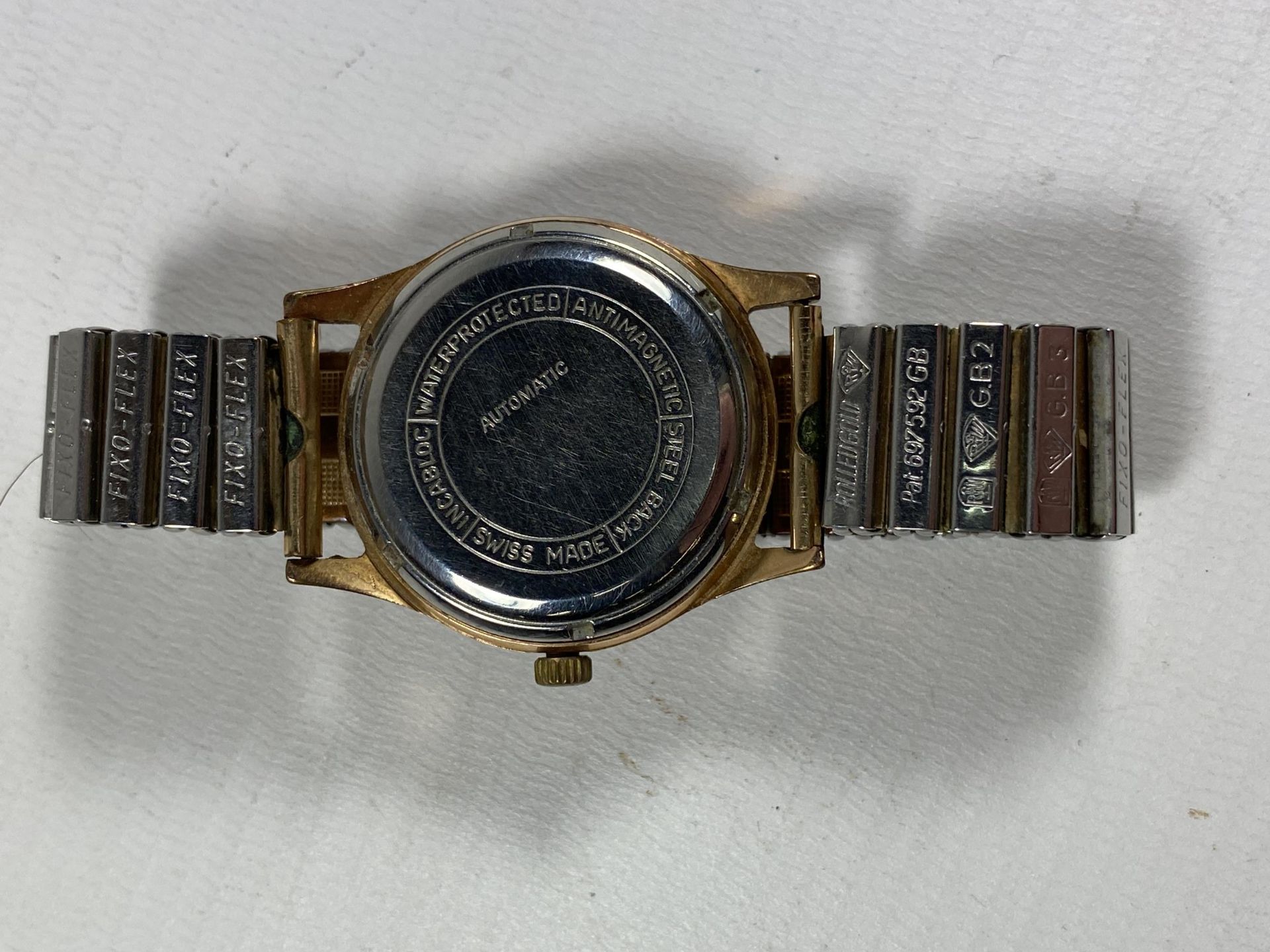 A VINTAGE 1960'S OPTIMA 30 JEWELS AUTOMATIC DATE WATCH - Image 3 of 3