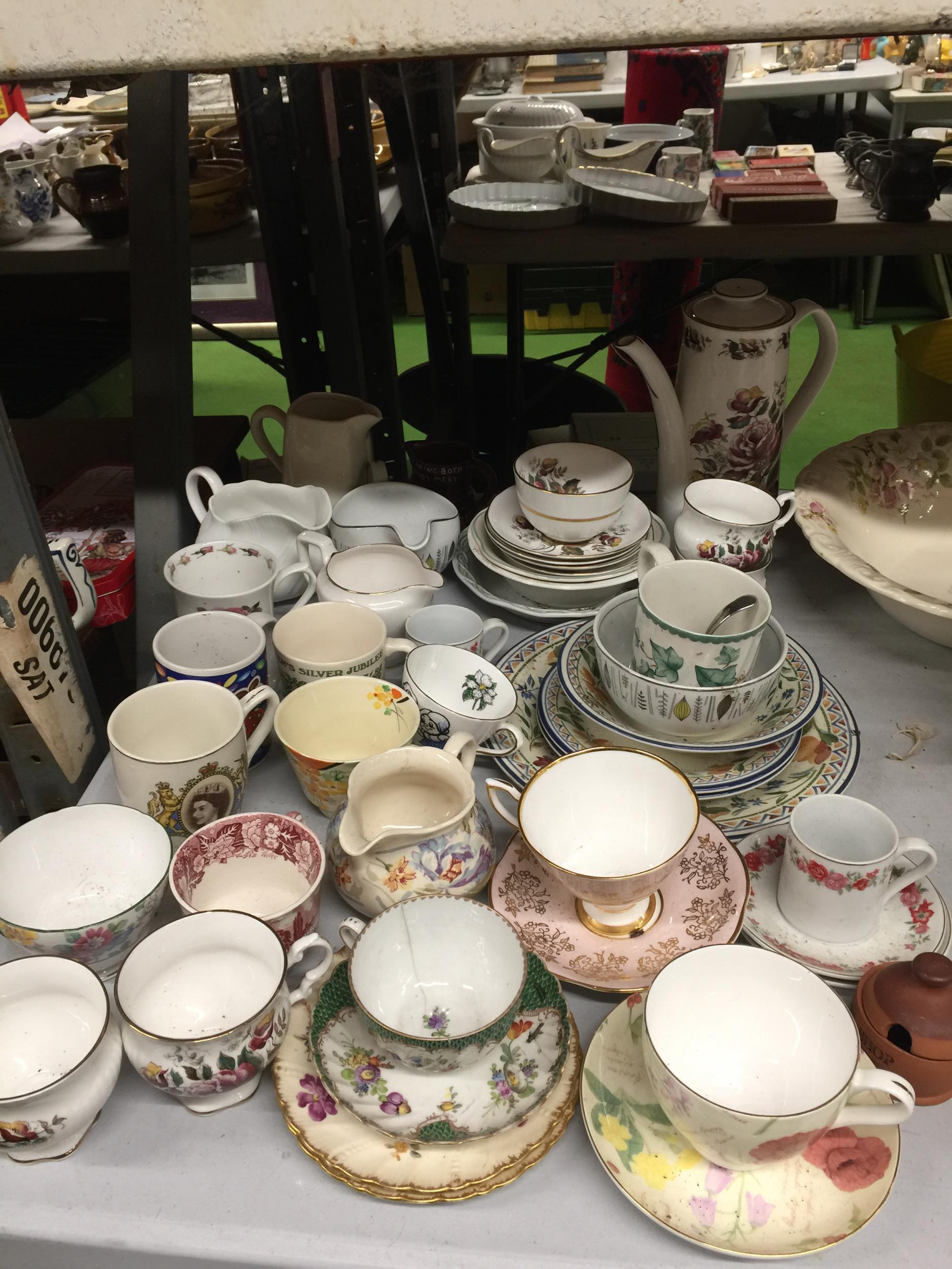 A LARGE QUANTITY OF CERAMICS TO INCLUDE CUPS, SAUCERS, MILK JUGS, COFFEEPOT, SUGAR BOWLS ETC.,