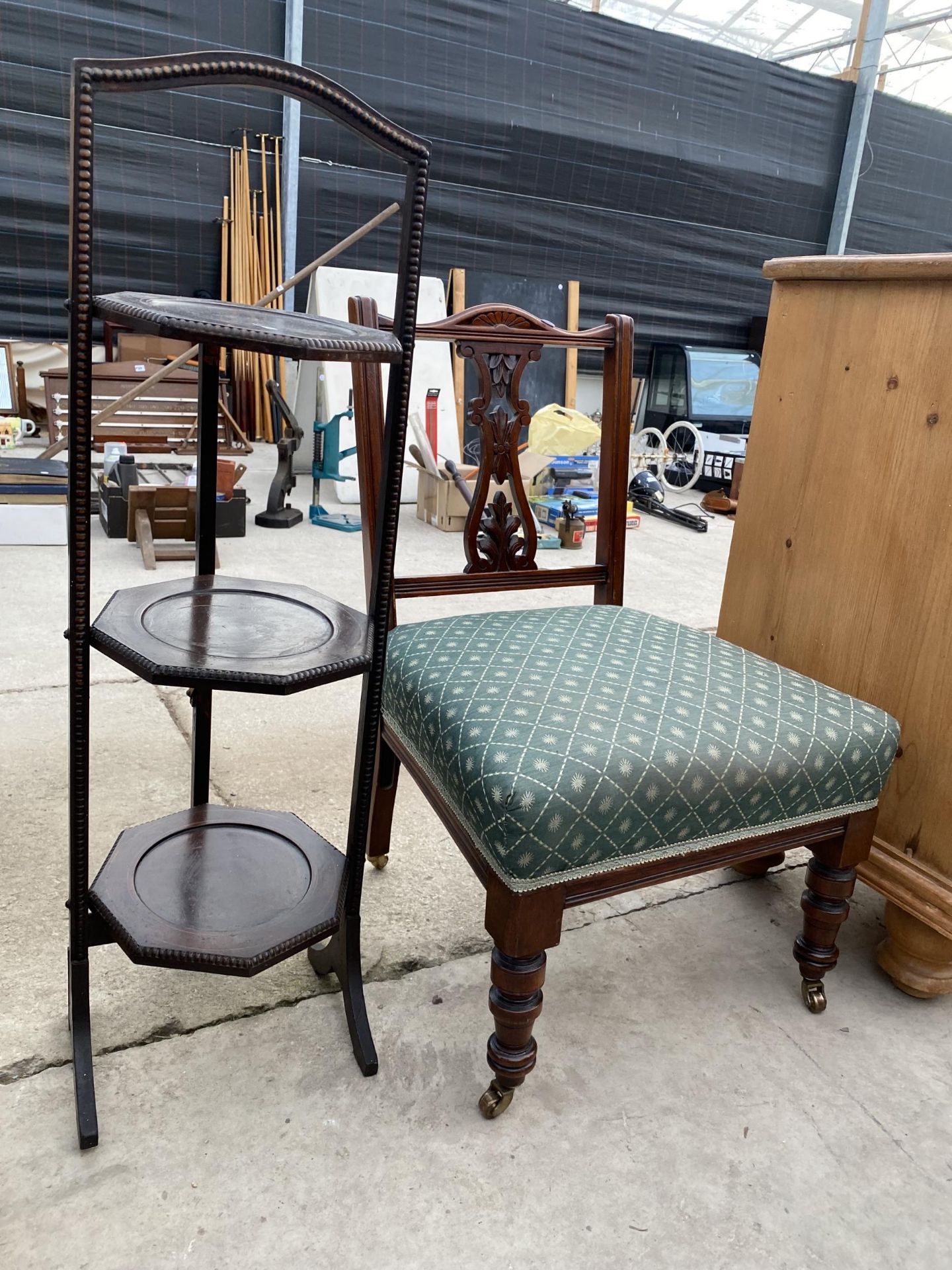 A LATE VICTORIAN NURSING CHAIR AND EARLY 20TH CENTURY MAHOGANY AND INLAID AFTERNOON TEA STAND - Image 2 of 2