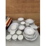 A PART COMPLETE CERAMIC DINNER SERVICE