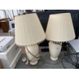 A PAIR OF CREAM CERAMIC TABLE LAMPS