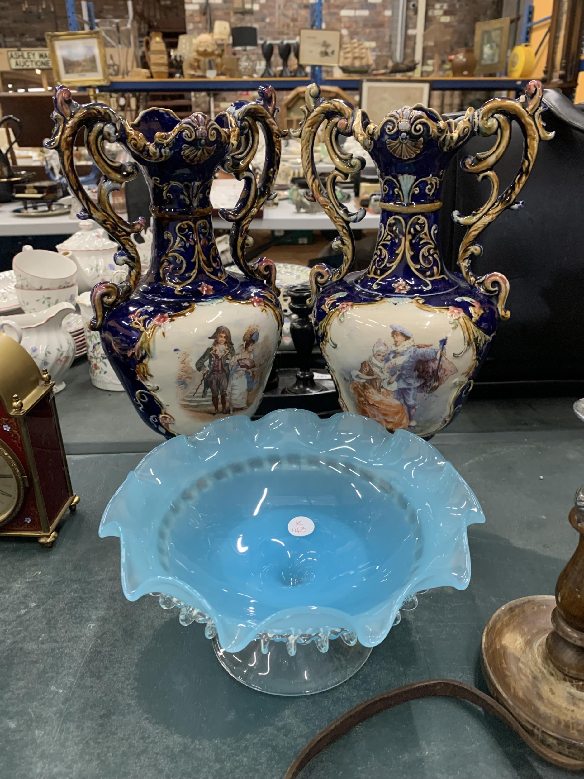 A PAIR OF VICTORIAN VASES IN COBALT BLUE WITH TRANSFER PRINT PATTERN PLUS A PALE BLUE GLASS FOOTED