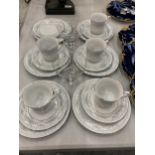 A QUANTITY OF CROWN MING CHINA CUPS, SAUCERS AND SIDE PLATES PLUS TWO GLASS DESSERT BOWLS