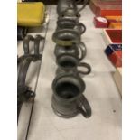 A QUANTITY OF GRADUATED PEWTER TANKARDS PLUS A SHIPS INKWELL