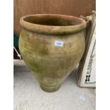 A LARGE TERRACOTTA POT