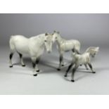 A GROUP OF THREE BESWICK DAPPLE GREY HORSE FIGURES